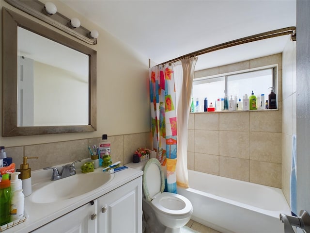 full bathroom featuring vanity, toilet, and shower / bathtub combination with curtain