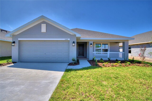 single story home featuring a garage, covered porch, and a front yard