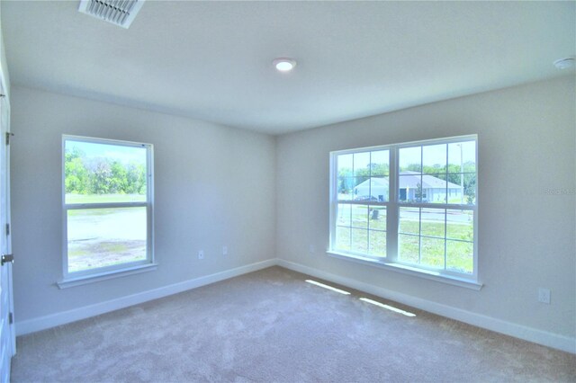 empty room featuring carpet floors