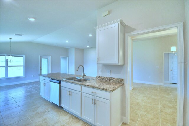 kitchen with sink, dishwasher, white cabinets, and light tile patterned floors