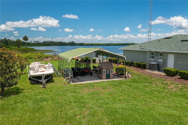 exterior space with a water view and central AC unit