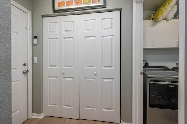 interior space featuring washing machine and clothes dryer