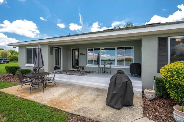 back of house featuring a patio area