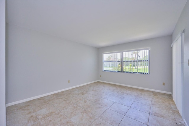 view of tiled spare room