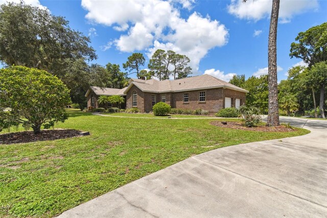 view of front of property with a front lawn