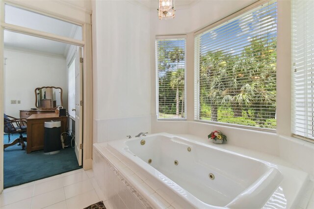 bathroom with tile patterned floors, crown molding, and a wealth of natural light