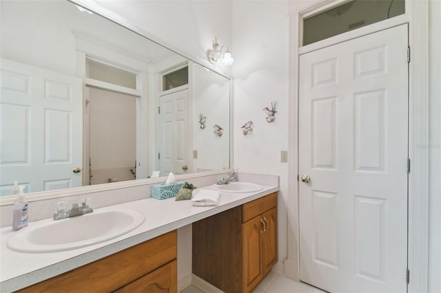 bathroom with tile patterned flooring and double sink vanity