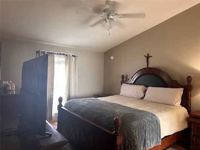 bedroom featuring ceiling fan and hardwood / wood-style floors