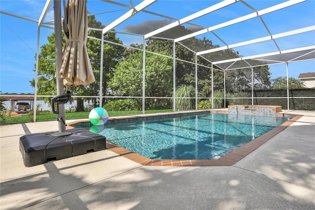 view of swimming pool featuring a patio, glass enclosure, and a hot tub