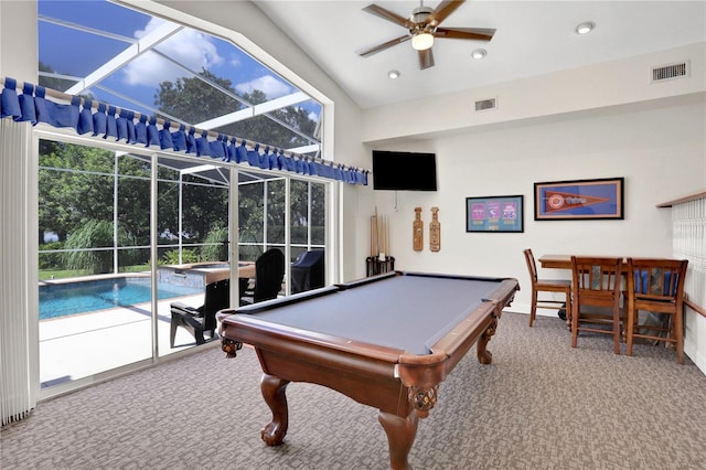 recreation room with ceiling fan and carpet