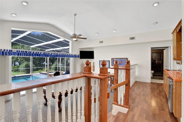 view of swimming pool with ceiling fan