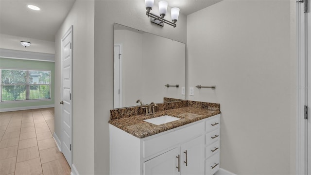 bathroom featuring tile patterned floors and vanity