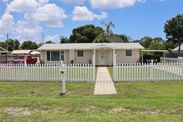 single story home featuring a front yard