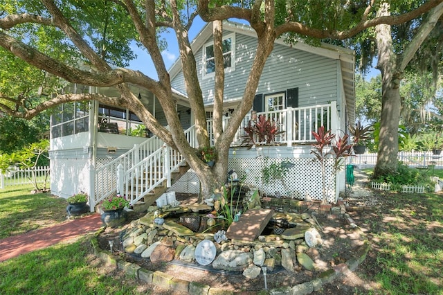 exterior space featuring a sunroom