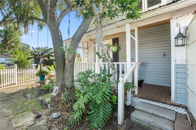 entrance to property with a porch