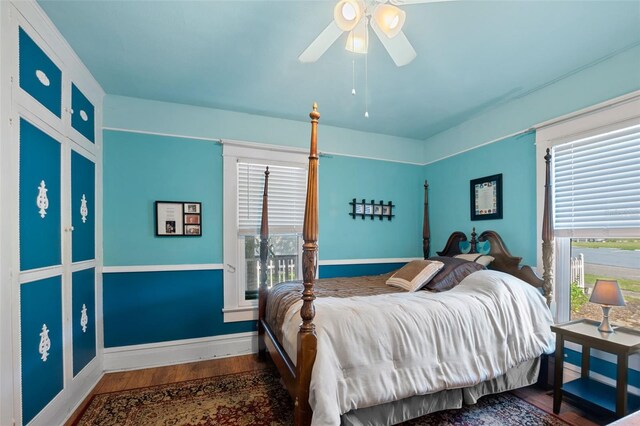 bedroom featuring hardwood / wood-style flooring and ceiling fan