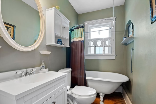 full bathroom with independent shower and bath, vanity, hardwood / wood-style floors, and toilet