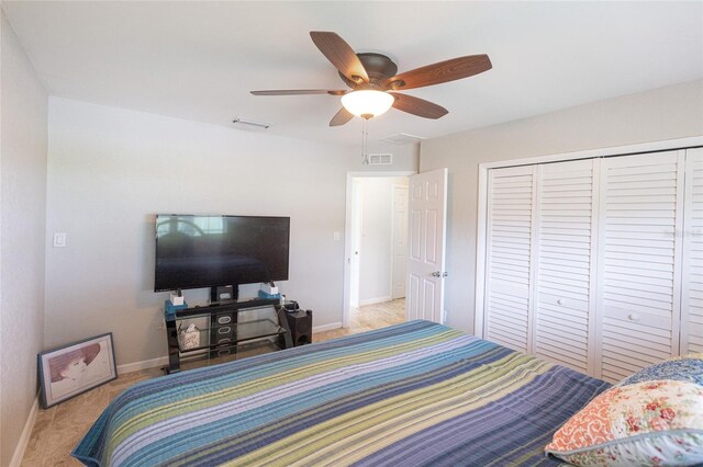 bedroom featuring a closet and ceiling fan