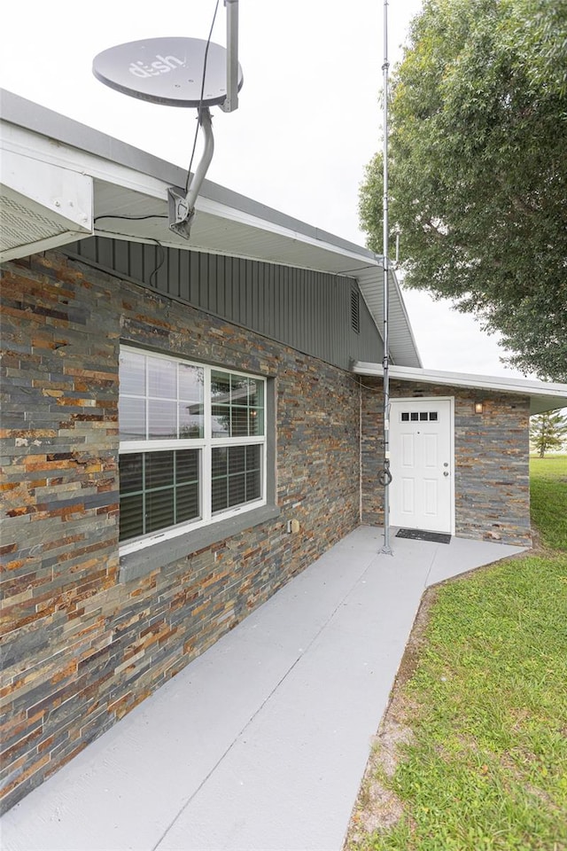 view of home's exterior featuring a yard