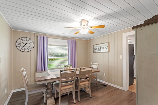 dining area featuring hardwood / wood-style floors and ceiling fan