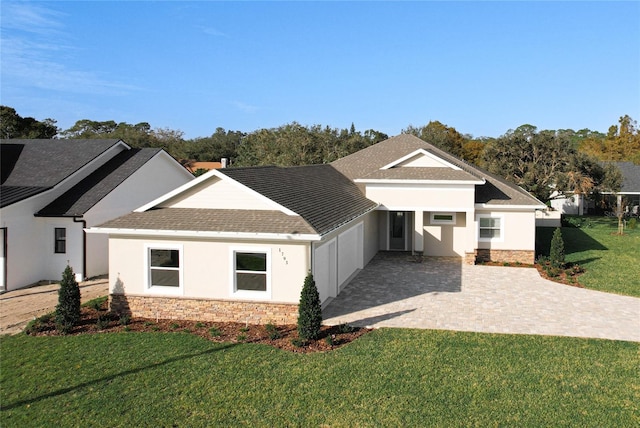 exterior space with a lawn and a garage