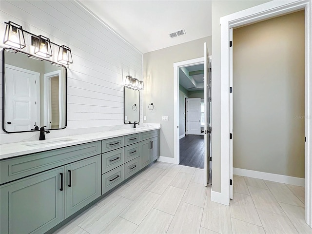 bathroom featuring wood-type flooring and vanity