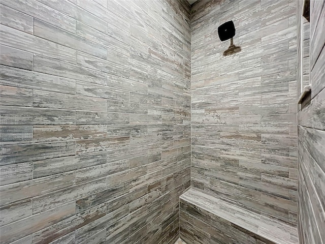 bathroom featuring tiled shower