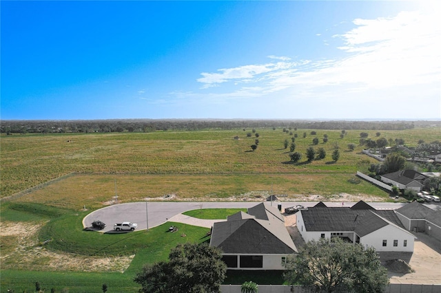 birds eye view of property featuring a rural view