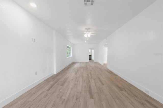 unfurnished living room with ceiling fan and light wood-type flooring