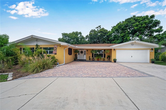 single story home with a garage