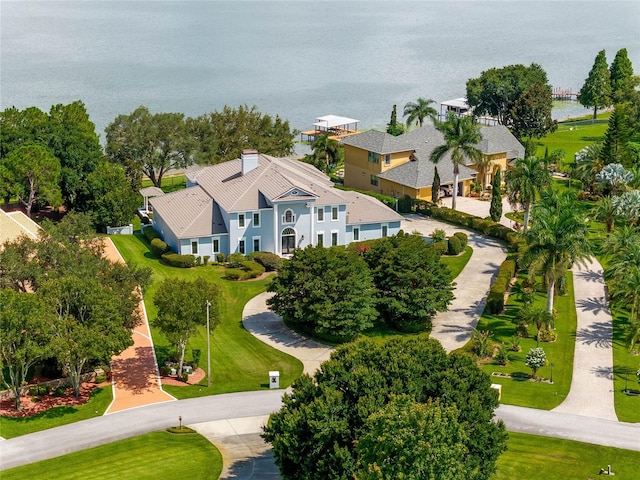 birds eye view of property featuring a water view