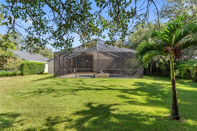 view of yard featuring a lanai