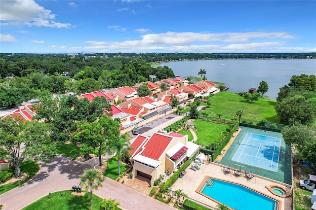 birds eye view of property featuring a water view