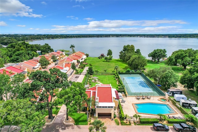 drone / aerial view with a water view