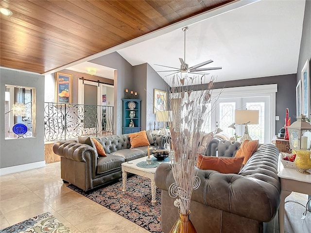 living room featuring lofted ceiling, a barn door, wooden ceiling, ceiling fan, and light tile patterned floors