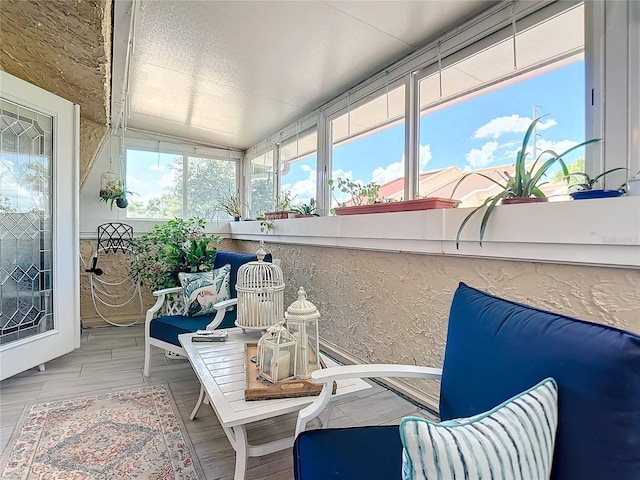 sunroom / solarium with lofted ceiling