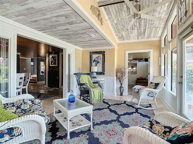 tiled living room featuring crown molding, ceiling fan, and wood ceiling