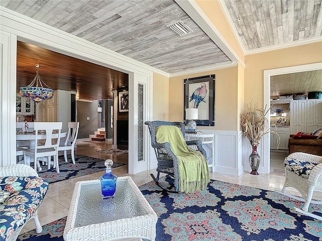 interior space featuring light tile patterned floors, crown molding, and wood ceiling
