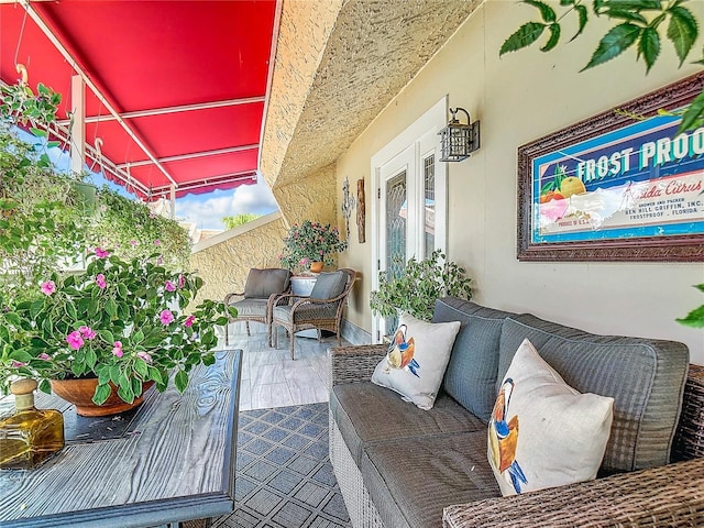 balcony featuring an outdoor hangout area and a patio area