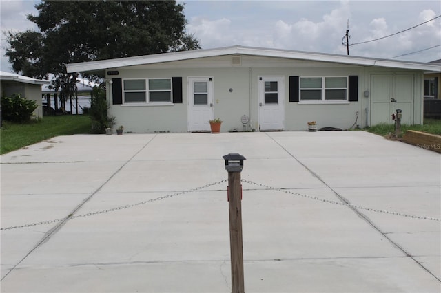 ranch-style house with a patio