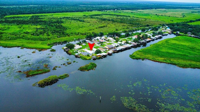 bird's eye view with a water view