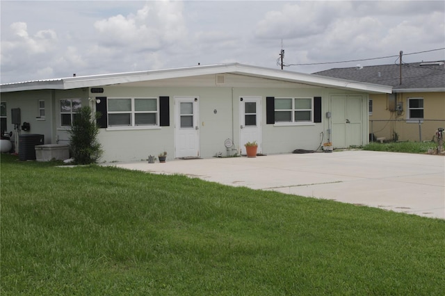 ranch-style house featuring central AC, a patio area, and a front yard