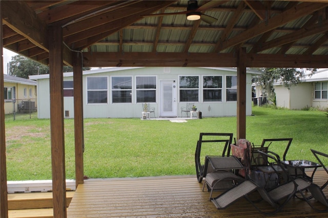 wooden deck with a yard, a gazebo, and ceiling fan