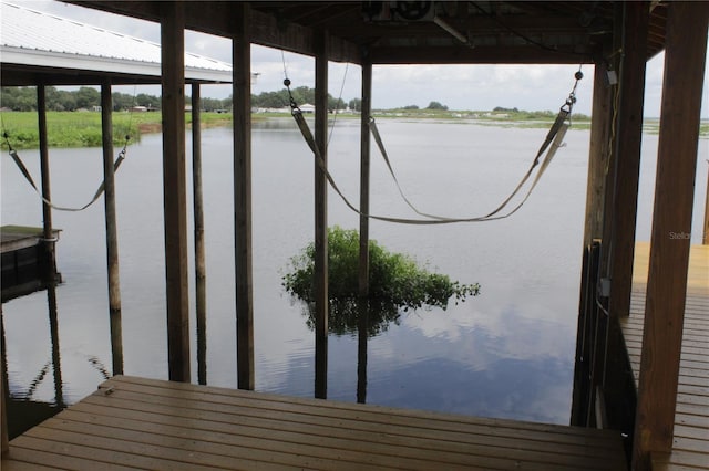 dock area featuring a water view