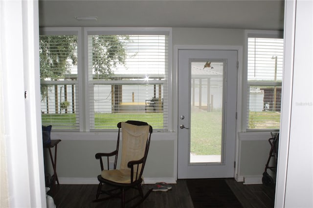 doorway to outside with dark hardwood / wood-style flooring