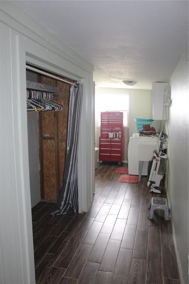 hallway featuring dark hardwood / wood-style floors