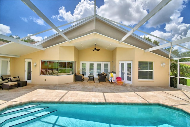 rear view of property featuring a lanai, a patio, french doors, and ceiling fan