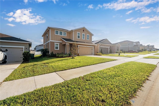 view of front facade with a garage and a front yard