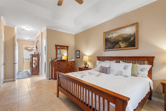 tiled bedroom featuring ceiling fan and ornamental molding