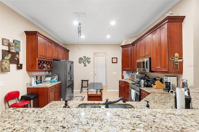 kitchen with sink, crown molding, stainless steel appliances, light tile patterned flooring, and kitchen peninsula